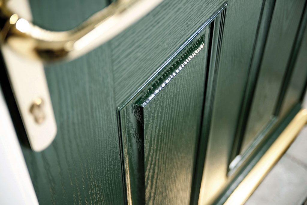 Green composite door close up